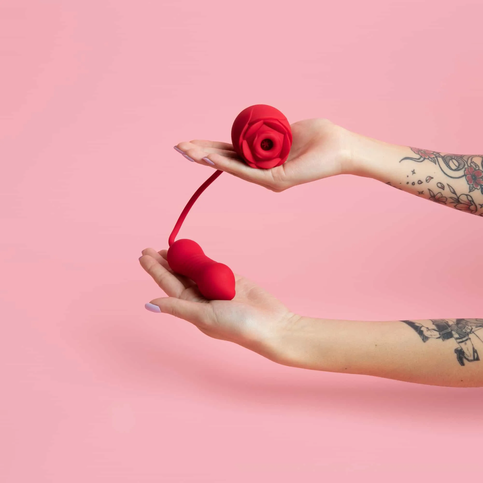 official double sided rose suction toy red held in hand